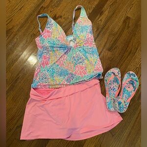 Lilly Pulitzer swimsuit and flip flops